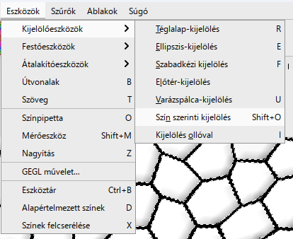Eszközök › Kijelölőeszközök: a Varázspálca-kijelölés (U) és a Szín szerinti kijelölés (Shift+O) egymás alatt.